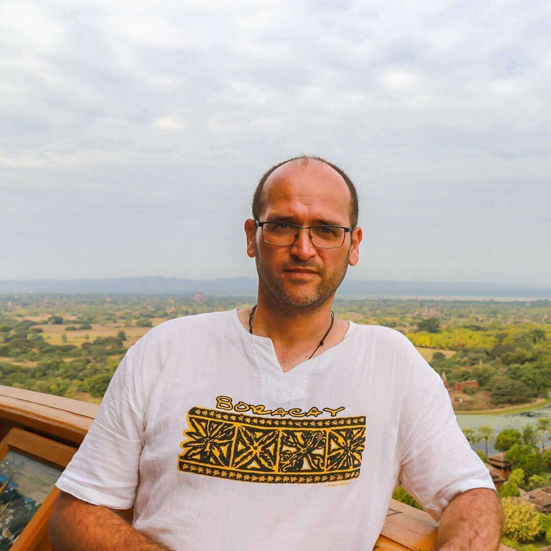 Portrait of man with landscape background